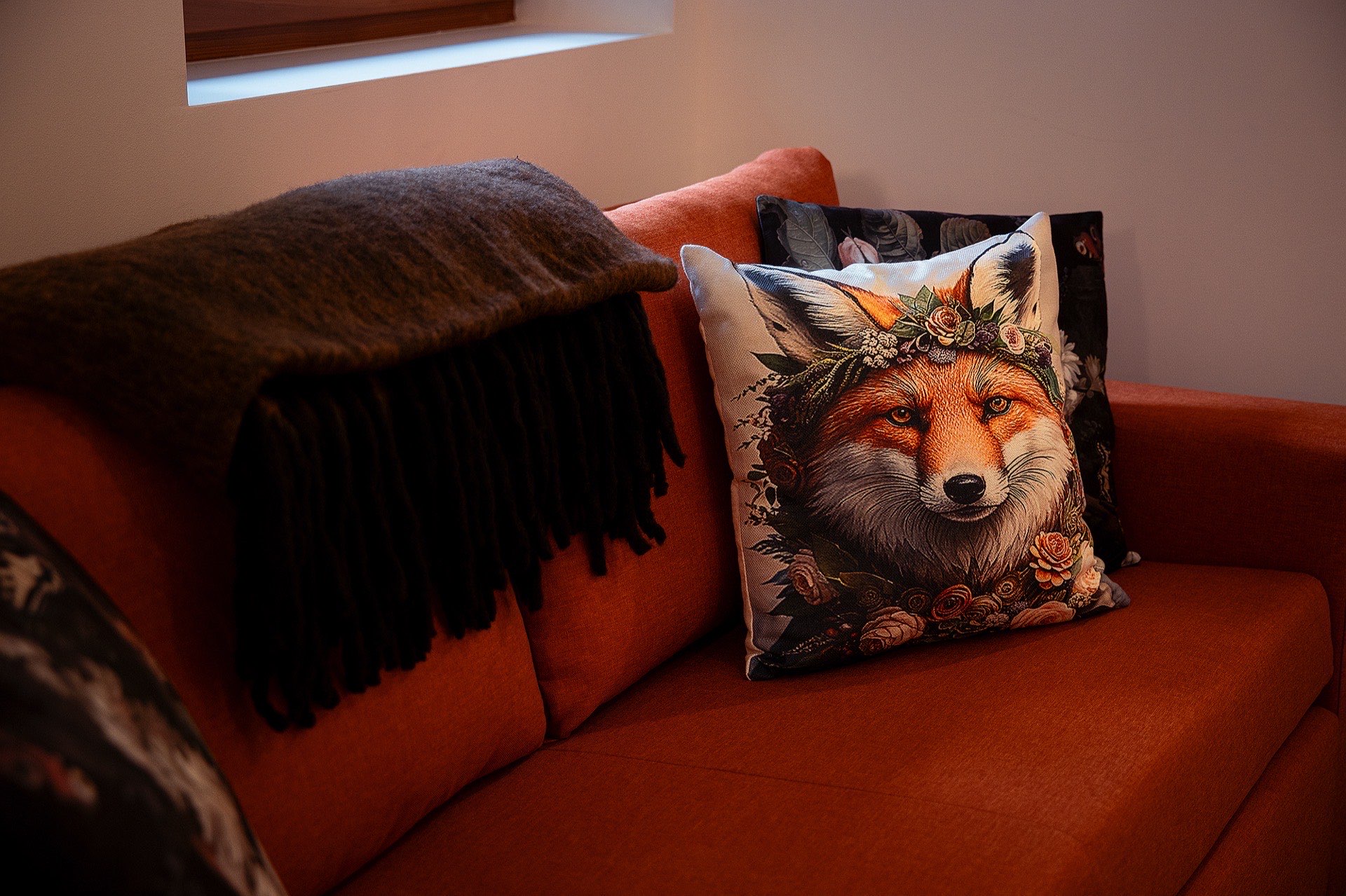 Fox cushion on the sofa in the Fox apartment